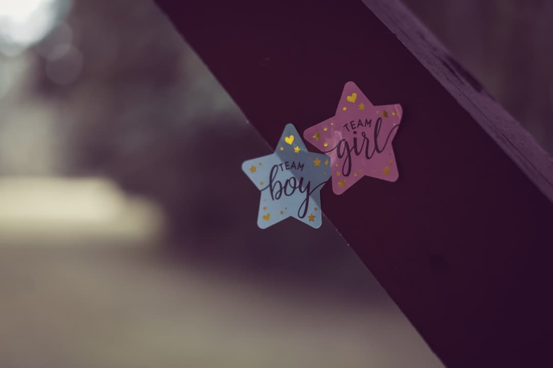 It's a gender reveal with "team boy, girl" stickers.